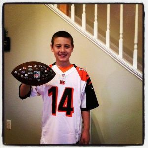 Brodie Deutsch rocking the jersey of his favorite football player, A.J. Green. 