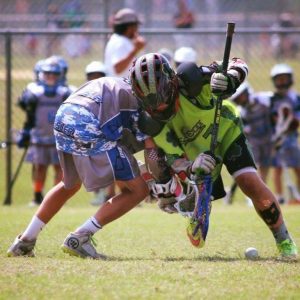 Brodie Deutsch battles during a face off for Cape Fear Shamrocks. Photos courtesy- Ayser Deutsch. 