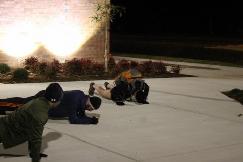 Frederiksen said, 'everyone can work at their own level, but everyone finishes the workout. No one gets left behind.' Frederiksen completed his workout with a weighted rucksack, for a simple reason, 'it's more challenging.' (Photo by Benjamin Schachtman)