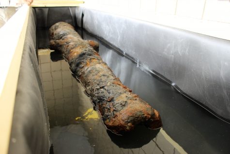 The cannon rests in its tank and will be covered in water until the electrolysis can start. 