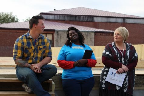 Left to Right: Trevor Andrews, construction supervisor, Samantha Aryeetey and Lynne Wooten, director of development for Cape Fear Habitat for Humanity. 