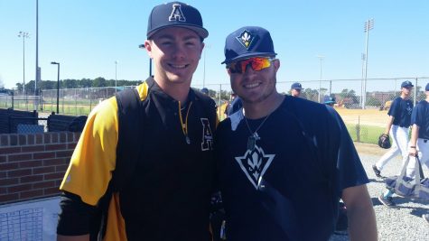 Former high school teammates Trader Flora, left, and Clark Cota were opponents on Sunday. 