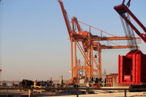 The port's 1970s-era German-built cranes are being replaced by state-of-the-art models capable of handling post-Panamex ships. (Photo Benjamin Schachtman)