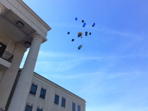 Balloons were released outside the courthouse on Monday, in memory of Caleb. Photo by Christina Haley.