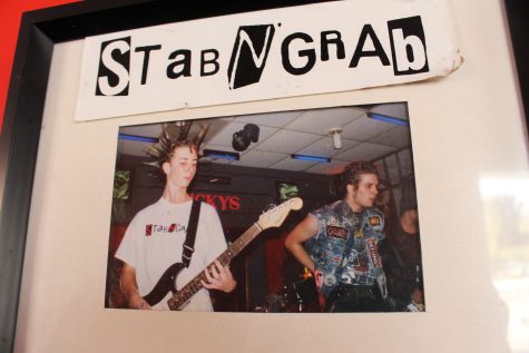 Cahoon pays homage to his past, including his time as guitarist for Wilmington band Stab n' Grab, seen performing here with full liberty spikes at defunct punk club Lucky's. (Photo Benjamin Schachtman)