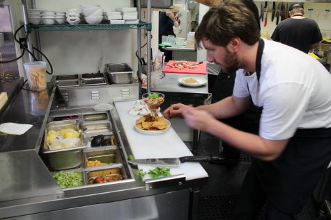 Savorez Chef Sam Cahoon has a soft-spoken southern style, and blink-and-you-miss-it speed when plating. (Photo Benjamin Schachtman)