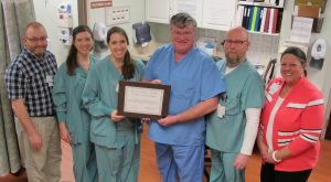 The Wound Care team at Dosher poses with its national 'Center for Excellence' award. (Courtesy of James Gross)