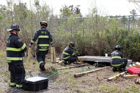 Team #11 working to lift a concrete slab as part of their training on Thursday.