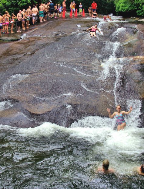 Bust your butts together --- or maybe just swim under a waterfall --- at Quarry Falls in Highland, N.C. (Port City Daily photo/COURTESY ROMANTICASHEVILLE.COM)
