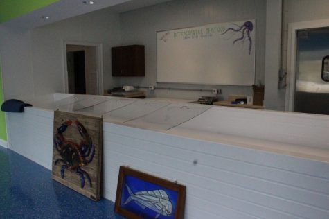 The construction crew had just finished the final touches on the new building. Owner G. Phillip David told Port City Daily, "we'll be decorating the next couple of days. Then we'll get the fish in there." (Photo Benjamin Schachtman)