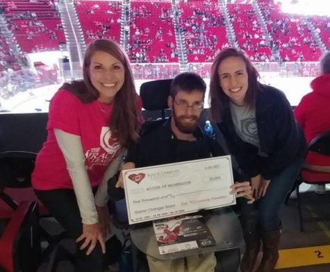 From left-to-right: Jennifer Bell, David Morrison and Kayla Jakubczak represent the Miracle League at Carolina Hurricanes game. Photos courtesy- ACCESS of Wilmington.