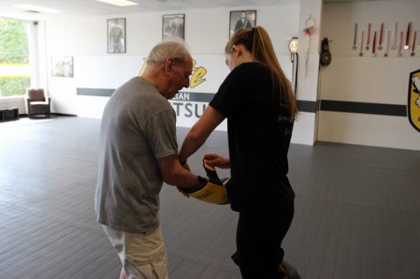 Ronald Hovey gets gloved up for one of his first boxing sessions. (Photo Benjamin Schachtman)