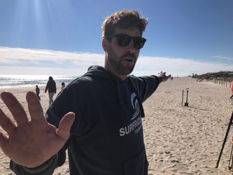 Ethan Crouch, chair of the Cape Fear Surfrider Foundation, during this year's Carolina Beach dune reclamation project. (Port City Daily photo / BENJAMIN SCHACHTMAN)