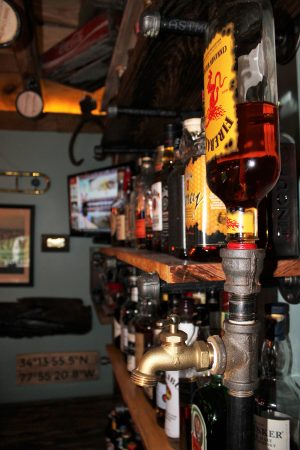 A fireball tap is just one of the many antique features in "Tatum's Pub Shed."