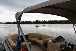 Riverwalk Watersports offers two 20 ft. Pontoon boats for rent. Each comes equipped with a 60 hp "Evinrude" outboard, ice coolers, a 'bimini' top, sound system, and seating for up to 10 people.