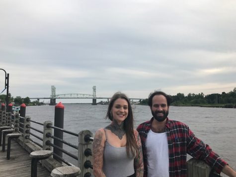 Anna Goddard and Michael "Mook" Cahill, with the Cape Fear Memorial Bridge - part of their planned logo, representing a bridge between people and resources. (Port City Daily photo / BENJAMIN SCHACHTMAN)