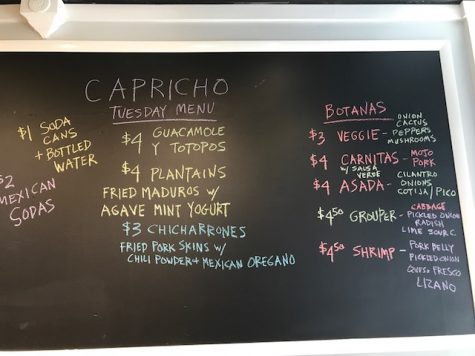 The menu on opening day. 'The chicharrones are serious,' Adriana Penley said. 'Like seriously good.' (Port City Daily photo / BENJAMIN SCHACHTMAN)