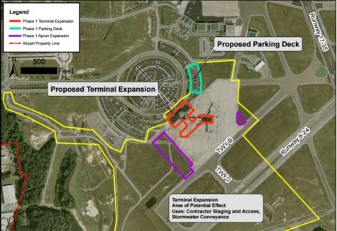Overhead property map view of the proposed expansion: the parking deck (in green) will be built on existing parking, adding 123 spots; the terminal apron (in purple) would add 150,000 square feet of taxing space for aircraft. (Port City Daily photo / COURTESY ILM)