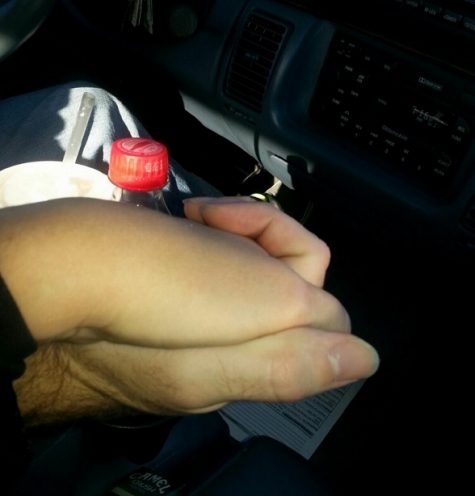 Cyndee Charlet and son Joshua Daughtry holding hands on the way to treatment. (Port City Daily photo / COURTESY CYNDEE CHARLET)