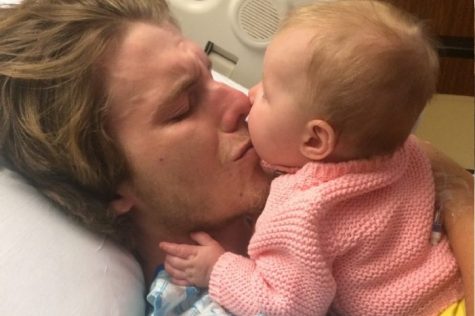 Collin McClearn and his daughter Abigail, shortly after the accident. (Port City Daily photo / COURTESY BRIANA MOYER)