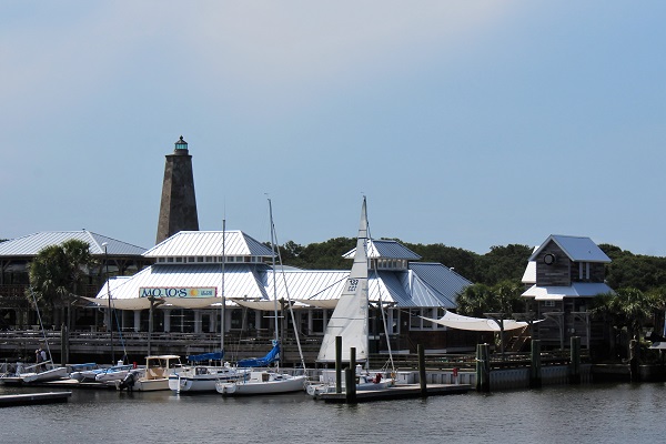 Bald Head Island, located 2 miles off the coast of Southport, is only accessible by boat or ferry, offering a "relaxed" environment for residents and tourists alike. (Port City Daily photo/CORY MANNION)
