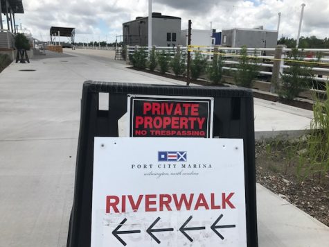 The area of the Riverwalk around the BlackFinn Ameripub is private property, and the bathroom trailers there are not open to the public. (Port City Daily photo / BENJAMIN SCHACHTMAN)