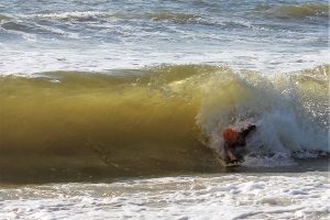 A competitor catches a barrel in the second heat. (Port City Daily photo/CORY MANNION)