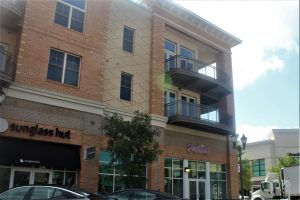 Developments like Mayfaire Town Center offer a place for residents to "live, work, and play," but with a hefty monthly rent, can employees at retail shops afford to live where they work? (Port City Daily photo/MICHAEL PRAATS)