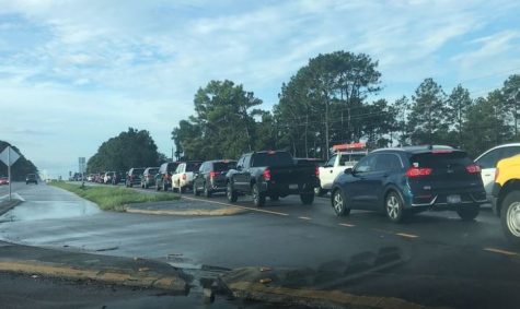 On North College Road, along with many other locations around the area, vehicles wait to merge -- are they doing it all wrong? (Port City Daily photo | Benjamin Schachtman)