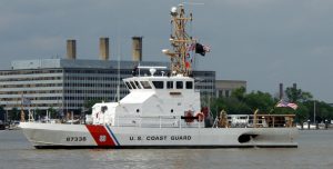 U.S. Coast Guard Cutter Ibis homeported in Cape May, NJ, anchored in the Anacostia River in Washington, DC, with U.S. Coast Guard Headquarters and the James Creek Marina in the background ... Ibis is an 87-foot Coastal Patrol Boat, built in 2000, and part of the Coast Guard's Marine Protector Class of vessels. (USCG Photo by Joseph P. Cirone,)