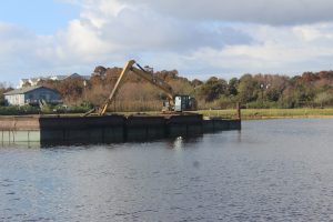 Excavators sit idly by in Carolina Beach while the town tries to find a location to dump dredging spoils after a misunderstanding with MOTSU (Port City Daily photo/MICHAEL PRAATS)