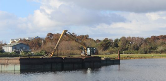 Excavators sit idly by in Carolina Beach while the town tries to find a location to dump dredging spoils after a misunderstanding with MOTSU (Port City Daily photo/MICHAEL PRAATS)