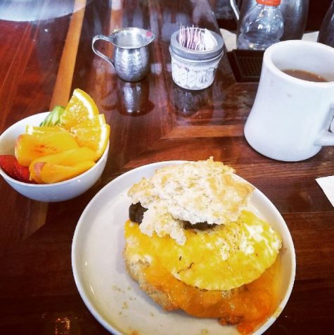 The sausage, egg and cheese biscuit - with a side of fruit - from Savorez, one of many host Sean Gallagher has reviewed. (Port City Daily photo / COURTESY MIDMOST COAST)