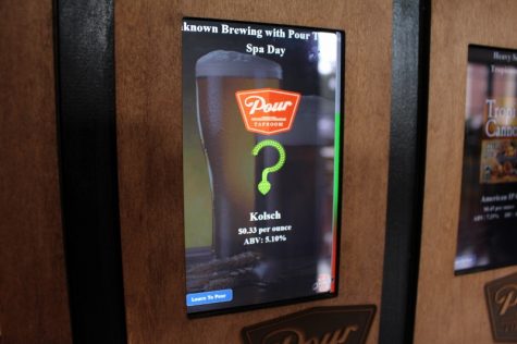 Pour feature several limited-run collaborations, like this cucumber Kolsh by Unknown Brewing out of Charlotte. Screens above the taps provide additional information about the beers. 