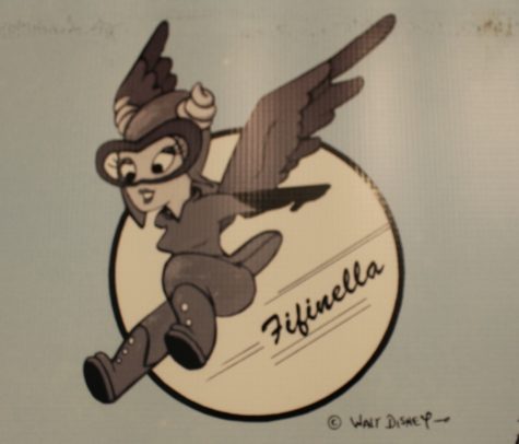 Walt Disney's 'Fifinella,' the mascot of the WASPS. Originally drawn for the Roald Dahl fantasy book about combat flying, 'The Gremlins,' Disney granted the mascot to the WASPs. (Port City Daily photo / (Port City Daily photo / MISSILES AND MORE MUSEUM)