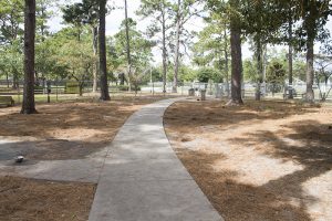Empie dog park opened in 2006 and features a gazebo and cement sidewalk leading into the enclosure for large dogs. (Port City Daily / photo JOHANNA FEREBEE)