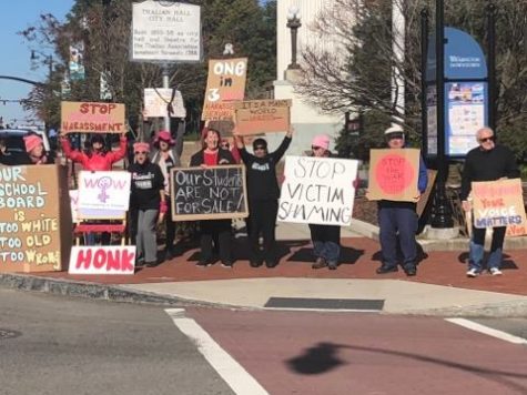 Protesters turned out Monday afternoon to voice their concerns with the New Hanover County School Board (Port City Daily photo/MICHAEL PRAATS)
