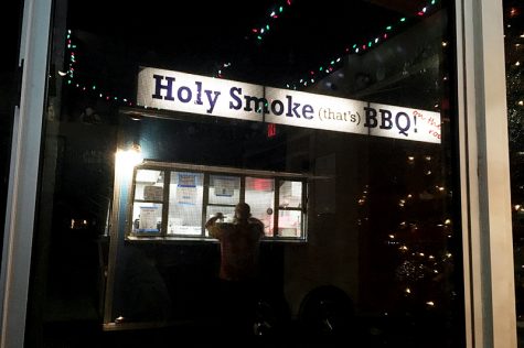 Mark Wilson, owner of Holy Smoke (that's) BBQ can only be seen from inside Good Hops Brewing rather than from the road due to code requirements in Carolina Beach he feels are restrictive. (Port City Daily photo / JOHANNA FEREBEE)