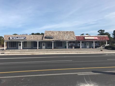 The partially abandoned storefronts at 125 South Kerr Avenue, proposed site of the Kerr Lofts project. (Port City Daily photo | BENJAMIN SCHACHTMAN)