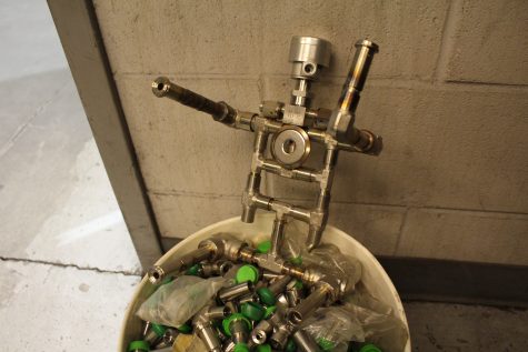 The welding program is hard work. But there's time for a little fun, too - like this robot made from spare parts. (Port City Daily photo | BENJAMIN SCHACHTMAN)