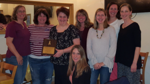 Wilmington Childhood Cancer Support Group presented their annual Compassionate Caregiver Award to Jenifer Phelps of the Healing Partnership. (Port City Daily photo/Courtesy of Wilmington Childhood Cancer Support Group)