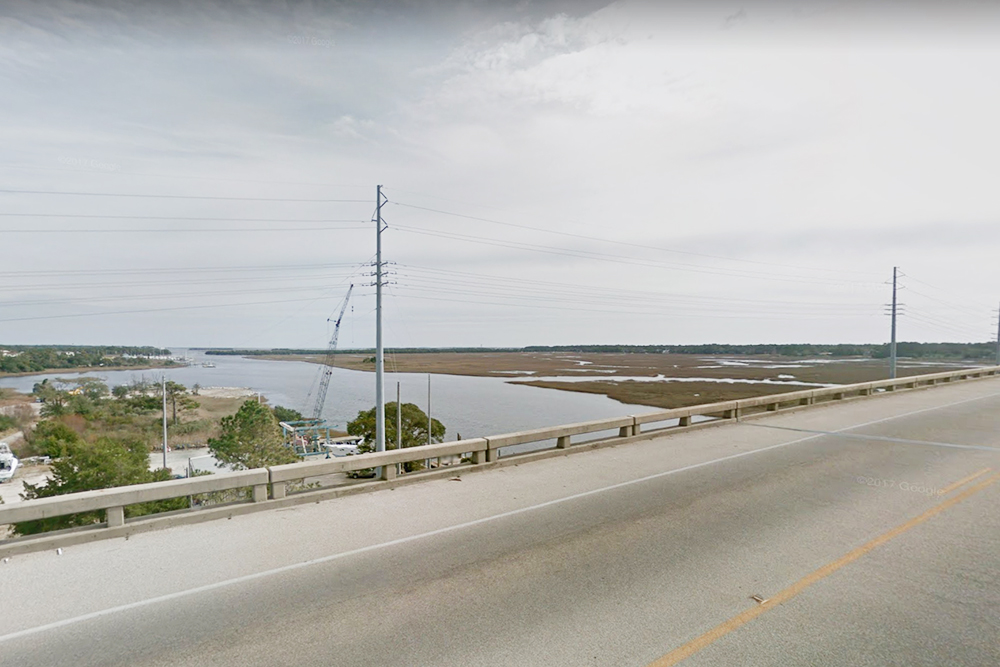 The Barbee Bridge which connects Southport and Oak Island is now receiving repairs from NCDOT crew members to address concrete damage. (Port City Daily photo /COURTESY GOOGLE MAPS)