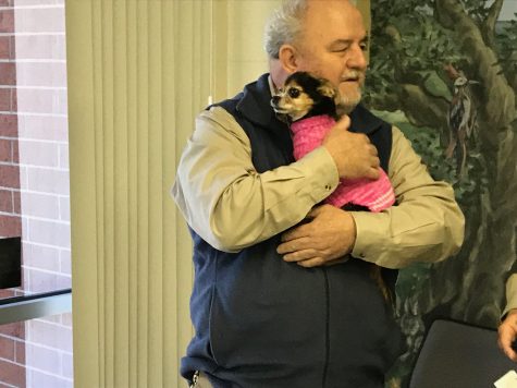 New Hanover County Animal Services reunites Gelson Cardoso with Princess, who went missing from his daugher's Miami-area house almost two years ago. (Port City Daily photo | BENJAMIN SCHACHTMAN)