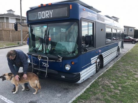 Johan Zwart, Rosy the dog and Dory the bus. (Port City Daily photo | BENJAMIN SCHACHTMAN)
