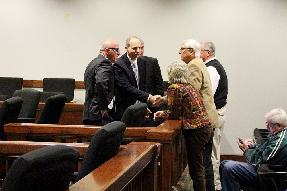 Attorneys for H2GO Brunswick Regional Water and Sewer and the town of Leland meet with H2GO board members in court earlier this month. (Port City Daily photo/ JOHANNA FEREBEE)