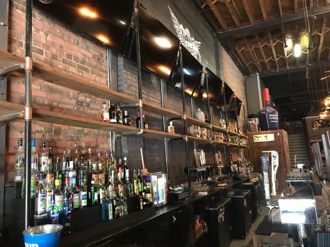 Rebellion NC's bar features plenty of whiskey and North Carolina craft beers. (Port City Daily photo | BENJAMIN SCHACHTMAN)