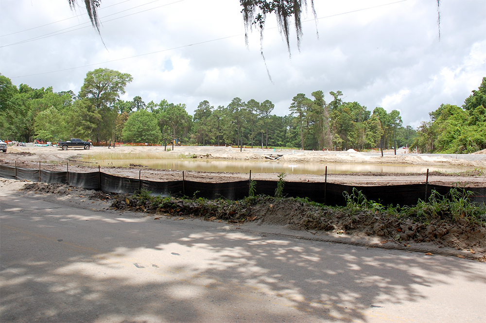 The day after the rain event, the State Street development installed silt fencing along its perimeter. (Port City Daily/Johanna Ferebee)