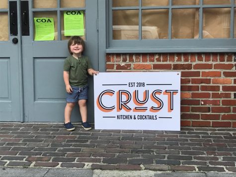 Co-owner Emily Luther's son Davis approves of the grilled-cheesed focus of the menu. (Port City Daily photo | Benjamin Schachtman)