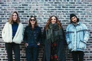 Four friends, Modern Legend owner Catherine Hawksworth, videographer Matt Marino, photographer, Haley Smith and musician Morgan Roberts have started a new agency to promote local musicians.
