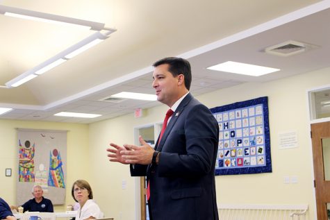 U.S. Representative David Rouzer speaks at the beach town breakfast about securing beach nourishment funding. (Port City Daily/Johanna Ferebee)